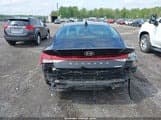 Black sedan rear damage source photo before Autowalk